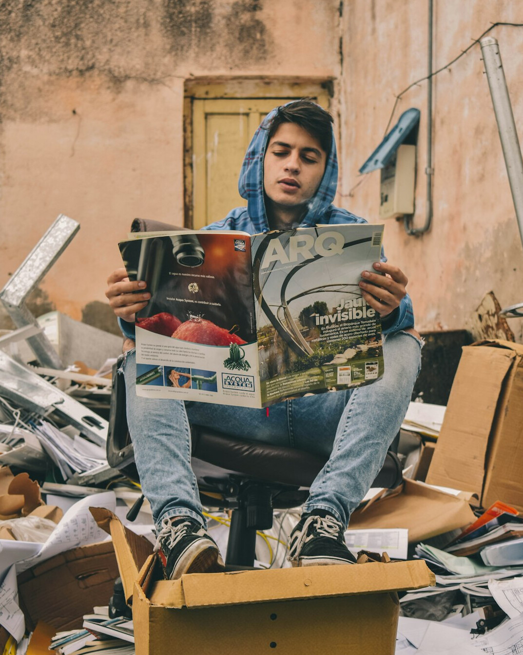 person sorting recycled paper
