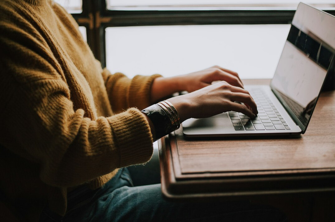 person using laptop